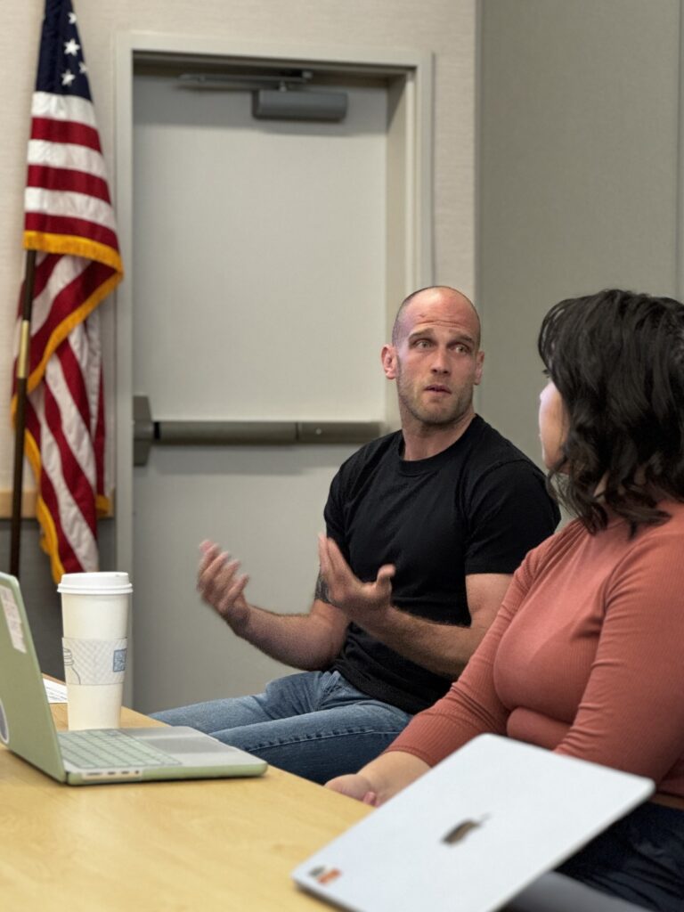 Two people discussing during a training