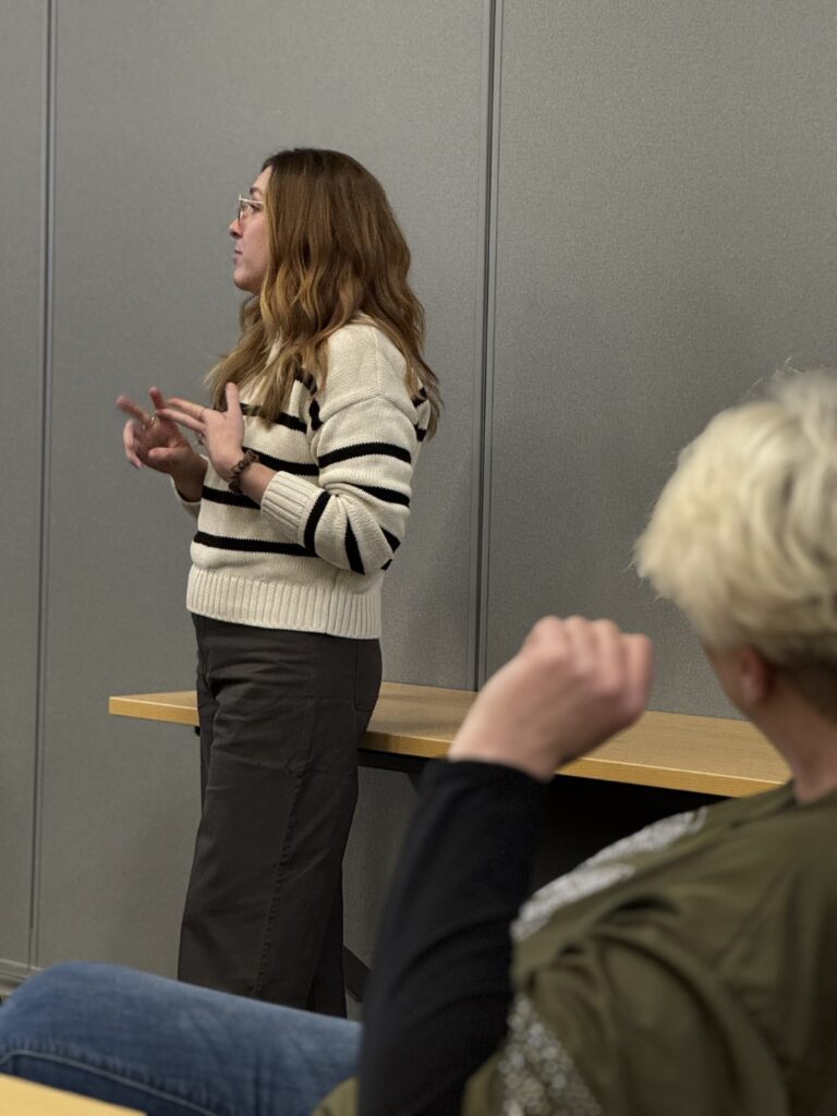 A woman presenting a training